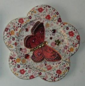 fleur papillon rouge